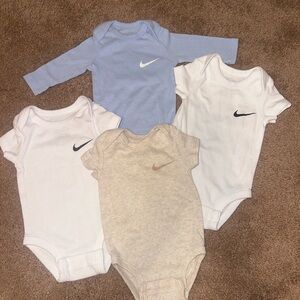 Nike Infant Bodysuits 4 pc - Blue, White, and Tan